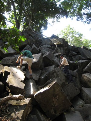climbing the ruins at Beng Mealea