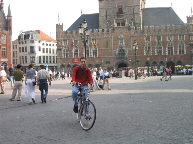 biking around Bruges' central square